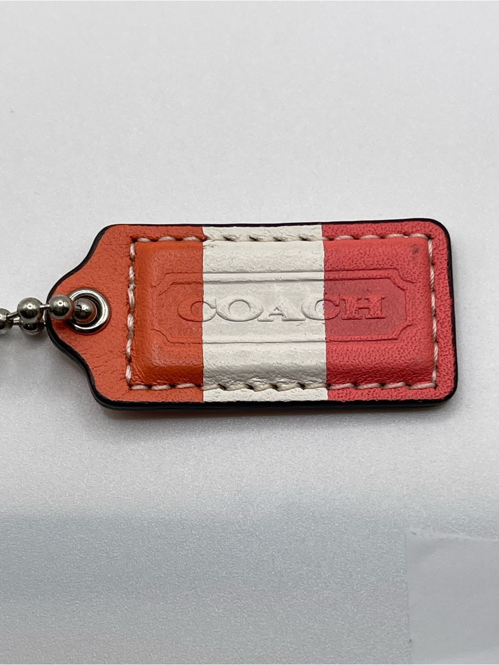 Coach Tricolor Leather Hang Tag in Orange, Peach and White
